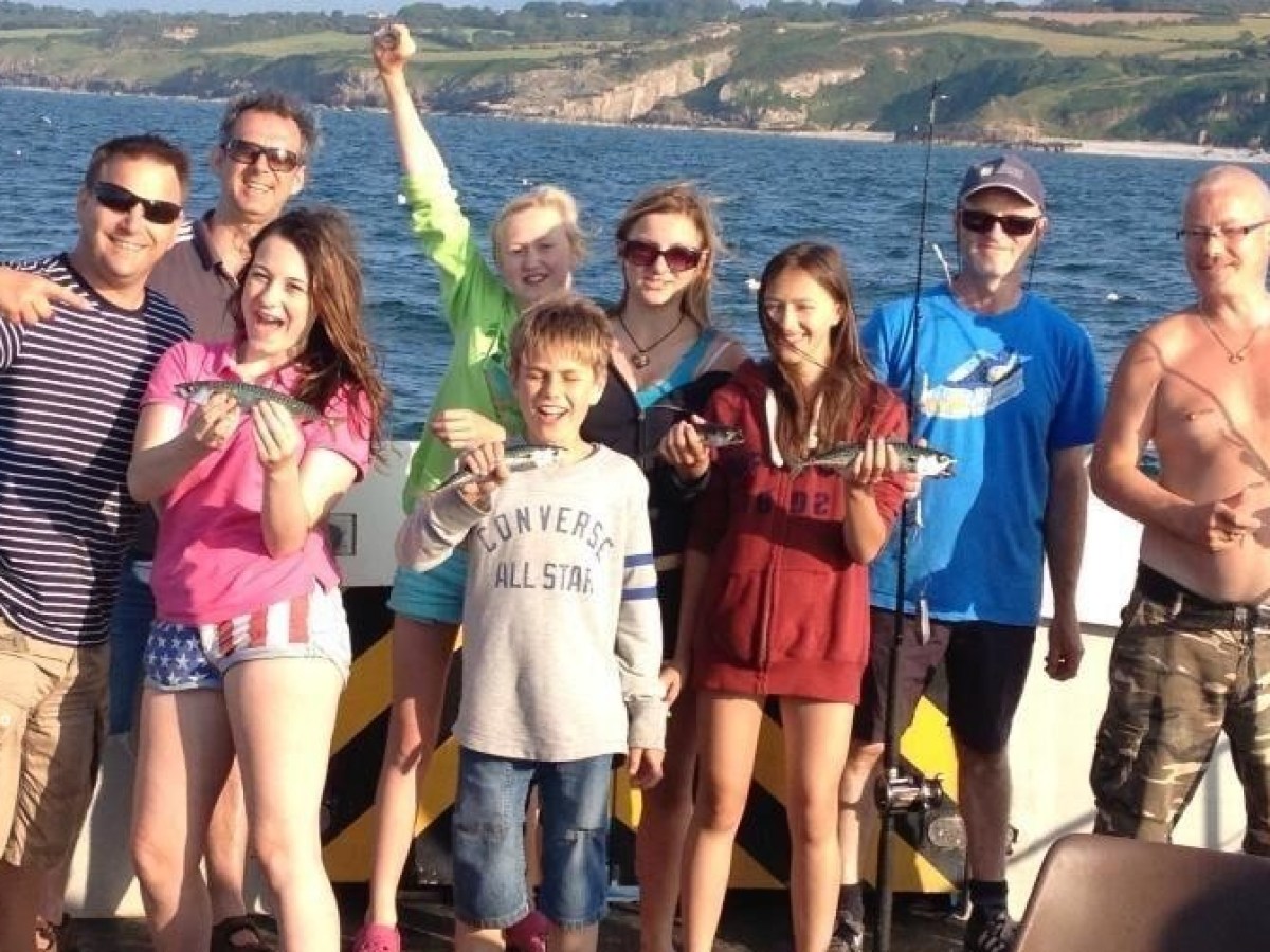 family with their fish