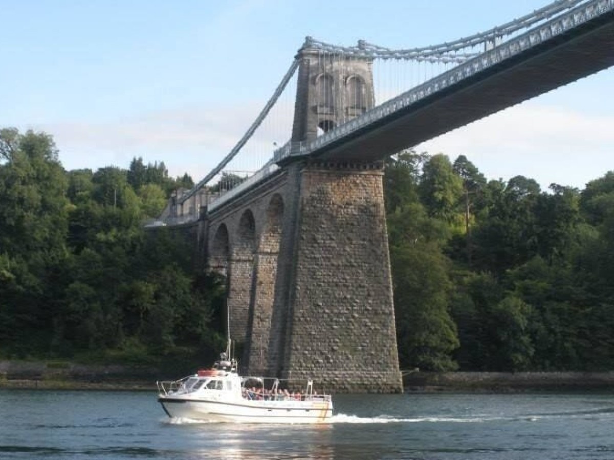 Bridge with boat going under
