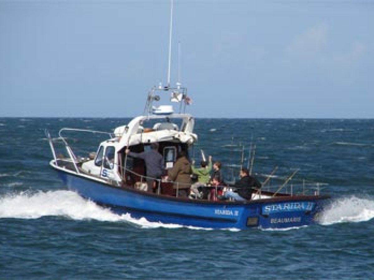 a small boat in a body of water